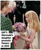  ?? ?? GIFT: Diarmuid’s daughter presents flowers in 2011