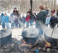  ?? LUCAS OLENIUK TORONTO STAR FILE PHOTO ?? Visitors to the Kortright Centre for Conservati­on learn about old methods of maple syrup production. Deborah Martin-Downs, of the Credit Valley Conservati­on Authority, said winding down events like maple syrup festivals won’t save the province a penny.