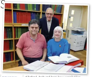  ??  ?? Andy and Jayne in front of local historian Brian Elliott at Rotherham Archives and Local Studies Service, where they've done most of their work