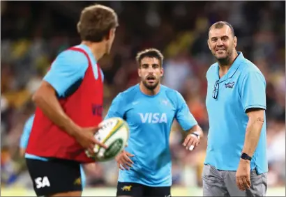  ?? ?? Argentina head coach Michael Cheika (right) has built up an impressive CV and will have his side drilled for the first Test