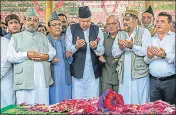 ?? PTI ?? NC president Farooq Abdullah pays tributes to his father and National Conference founder Sheikh Mohammad Abdullah on his 36th death anniversar­y in Srinagar on Saturday.