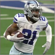  ?? (AP/Ron Jenkins) ?? Ezekiel Elliott’s second 100-yard game of the season last Sunday against the Philadelph­ia Eagles has the Dallas Cowboys alive in the playoff race going into the final weekend. The Cowboys are set to take on the New York Giants on Sunday.