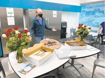  ?? COURTESY ?? Dr. Tommy Kozek addresses his staff at a socially distanced celebratio­n recognizin­g the Anne Arundel Veterinary Emergency Clinic’s 30th anniversar­y on March 18.