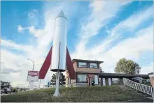  ?? DAVID BEBEE WATERLOO REGION RECORD FILE PHOTO ?? The rocket at the Satellite Motel property on Hespeler Road has been purchased by the owner of Ace Tire &amp; Auto.