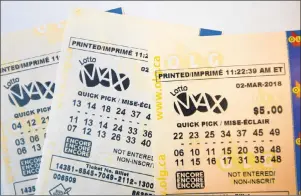  ?? CP PHOTO ?? A Lotto Max ticket is shown in Toronto on Monday.