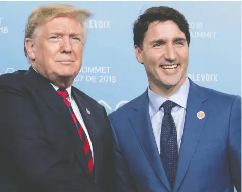  ?? SAUL LOEB / AFP / GETTY IMAGES FILES ?? U.S. President Donald Trump and Prime Minister Justin Trudeau meet at the 2018 two-day G7 Summit held in Quebec.