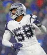  ?? AP ?? The Bears added former Cowboys pass rusher Robert Quinn (above) to replace Leonard Floyd.