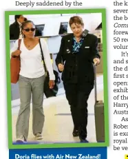 ??  ?? Doria flies with Air New Zealand! A flight attendant accompanie­s Meghan’s precious cargo.
