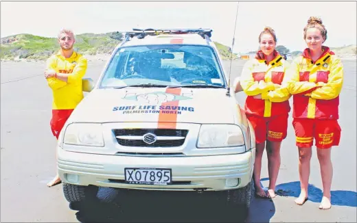  ??  ?? Feargus Scherczer is patrolling at Himatangi Beach with Abbie Bognuda (left) and Britney O’Hara from the Palmerston North Surf Lifesaving Club.