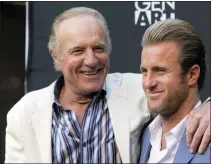  ?? CHRIS PIZZELLO THE ASSOCIATED PRESS ?? Scott Caan, right, writer/ producer/star of the film “Mercy,” poses with his father, fellow cast member James Caan, at the premiere of the film in Los Angeles in 2010.