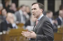  ?? CP PHOTO ?? Finance Minister Bill Morneau says he recognizes the importance of transparen­cy when it comes to scrutinizi­ng how government spending impacts people.