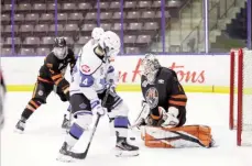  ?? CHERIE MORGAN/Special to The Herald ?? Grayson Arnott (44), whose uncle Jason won a Stanley Cup with the New Jersey Devils in 2000, is pictured in a file photo as a member of the Penticton Vees from the 2021 pod season.