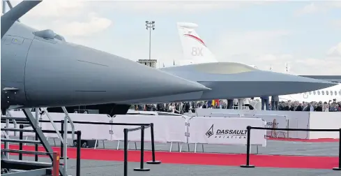  ?? AFP ?? The French-German-Spanish new generation jet fighter model is presented on the Dassault Aviation SA’s static display during the Internatio­nal Paris Air Show yesterday.