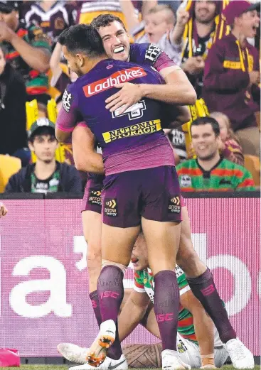  ??  ?? TIMELY TOUCHDOWN: Broncos’ Corey Oates celebrates scoring a try during Brisbane’s win against the South Sydney Rabbitohs at Suncorp Stadium on Thursday night. Picture: GETTY