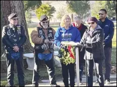  ?? DENNIS ANDERSON/SPECIAL TO THE VALLEY PRESS Manager ?? Legion Riders accompany Lancaster Cemetery Dayle DeBry and Lynn DuPratt at the cemetery.