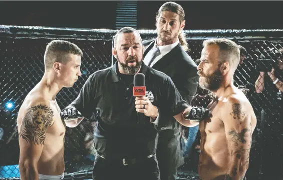  ?? IFC FILMS ?? In the new film Embattled, father and son take their issues into the Octagon for an MMA faceoff. The film stars east Vancouver's Darren Mann, left, and Stephen Dorff, right.
