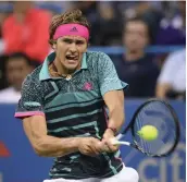  ?? AP ?? Alexander Zverev of Germany returns to Japan’s Kei Nishikori in the Citi Open tournament in Washington on Friday. Zverev won 3- 6, 6- 1, 6- 4. —