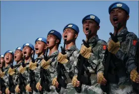  ?? REUTERS ?? REPRESENTA­TIVE PHOTO: Chinese troops take part in marching drills ahead of a military parade in Beijing in September 2019.