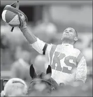  ?? AP/MATT SLOCUM ?? Javier Castellano celebrates after coming from behind to win with Cloud Computing in The Preakness Stakes.