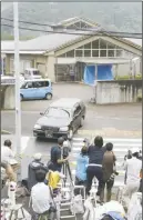  ?? KAzUSHIgE FUjIKAKE/KYODO NEwS VIA AP ?? A hearse leaves the Tsukui Yamayuri-en, a facility for the mentally disabled where a number of people were killed and dozens injured in a knife attack Tuesday.