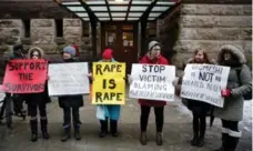  ?? REUTERS ?? Protesters rally outside the courthouse where Ghomeshi was acquitted.
