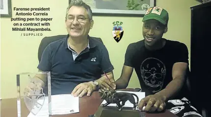  ?? / SUPPLIED ?? Farense president Antonio Correia putting pen to paper on a contract with Mihlali Mayambela.