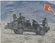  ?? Picture: ABC ?? A Nazi flag flies over an Australian Army vehicle in Afghanista­n.