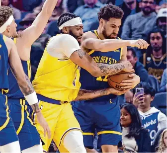  ?? Scott Strazzante/The Chronicle ?? Klay Thompson, right, and the Warriors went 3-1 in their four regular-season matchups with the Lakers, who are currently on pace to be their opponent in their play-in tournament opener.