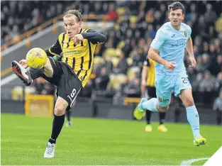  ??  ?? The ball is on its way into the net courtesy of East Fife’s Jamie Insall.