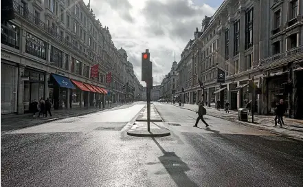  ?? AP ?? London’s Regent Street is almost deserted after Prime Minister Boris Johnson said that Covid-19 was ‘‘the worst public health crisis for a generation.’’