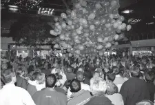  ?? ?? Balloons away in the Nicholsons Centre as part of the Christmas lights event in 1997. Ref:135064-7