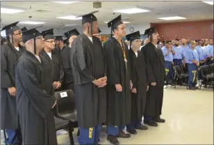  ?? JULIO MORALES PHOTO ?? Twenty-three Calipatria State Prison inmates obtained their GED, while three others obtained their assiocate’s degree, during a graduation ceremony on Friday.