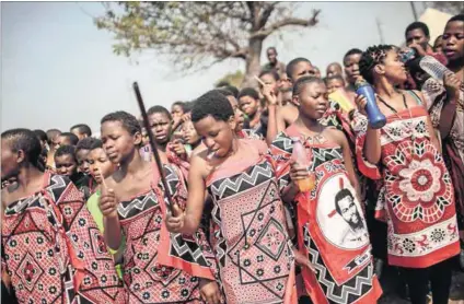  ?? Photo: Giunluigi Guercia/AFP ?? Rights of passage: Swazi girls and women have the same rights as boys and men in the country’s Constituti­on, but strong patriarcha­l traditions make it difficult for them to exercise these rights.