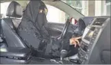  ?? REUTERS/FILE ?? A woman in her car in Saudi Arabia.