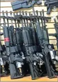  ?? BECK/AFP ROBYN ?? Semi-automatic rifles are seen for sale in a gun shop in Las Vegas, Nevada, on October 4.