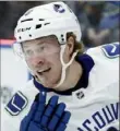  ?? The Associated Press ?? Brock Boeser smiles after scoring one of three goals.