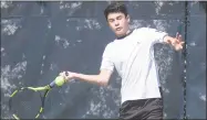  ?? John Nash / Hearst Connecticu­t Media ?? Zach Kaplan of Westport hits a forehand during his match at Thursday’s Connecticu­t Open Family Tennis Tournament championsh­ip match at Yale University.