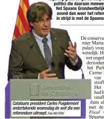  ?? Foto REUTERS ?? Catalaans president Carles Puigdemont onderteken­de woensdag de wet die een referendum uitroept.