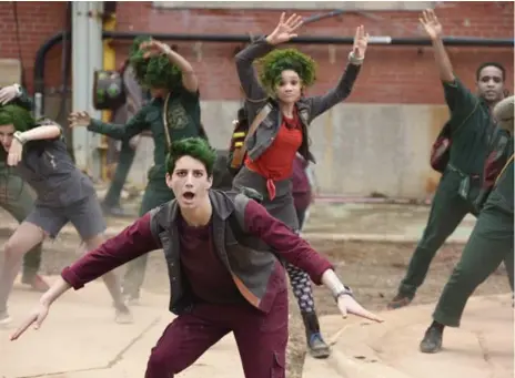  ?? JOHN MEDLAND/DISNEY CHANNEL ?? Milo Manheim plays Zed, a charismati­c zombie determined to play football in Zombies, which looks at a semester at Seabrook High School.