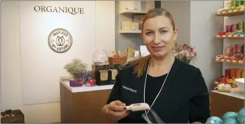  ??  ?? Anna Baprawska packing guava bath power at her newly opened shop, Organique, in Gorey.