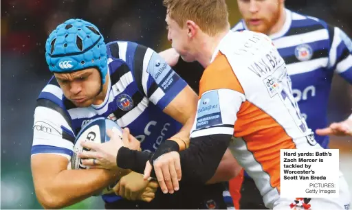  ?? PICTURES: Getty Images ?? Hard yards: Bath’s Zach Mercer is tackled by Worcester’s Scott Van Breda