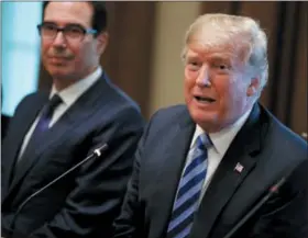  ?? EVAN VUCCI — THE ASSOCIATED PRESS ?? Treasury Secretary Steve Mnuchin, left, listens as President Donald Trump speaks during an expanded bilateral meeting with the Emir of Kuwait Sheikh Sabah Al Ahmad Al Sabah in the Cabinet Room of the White House, Wednesday in Washington.