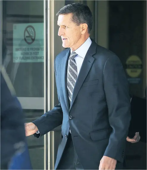  ?? CHIP SOMODEVILL­A / GETTY IMAGES ?? Michael Flynn, former national security adviser to President Donald Trump, leaves following his plea hearing at the E. Barrett Prettyman Federal Courthouse on Friday in Washington, D.C.. where he pleaded guilty to lying to the FBI.