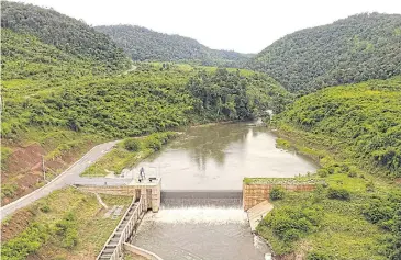  ??  ?? A view of the B.Grimm hydropower project in Laos. The company is targeting projects in a number of countries to boost capacity.