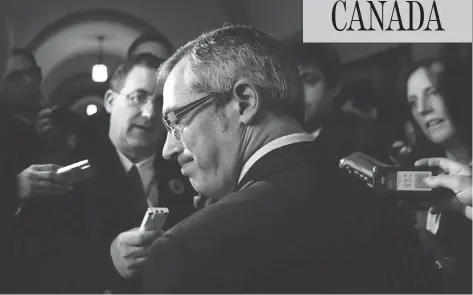  ?? CHRIS ROUSSAKIS / QMI AGENCY ?? Conservati­ve MP Tony Clement faces members of the media after caucus in Ottawa in November 2010.