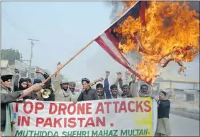 ?? Getty Images ?? A protest in Multan, Pakistan, decries U.S. drone attacks. The UN launched an inquiry into
the impact and human rights implicatio­ns of drones in January.