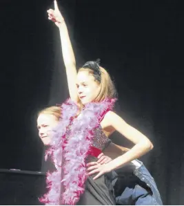  ??  ?? Sappho Thompson and Molly Thompson entertaine­d the audience with their performanc­e of ‘I’m Number One’ in the musical theatre duet, age 15 and under, division of the Truro Music Festival.