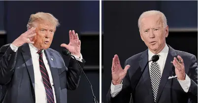  ?? PATRICK SEMANSKY THE ASSOCIATED PRESS FILE PHOTO ?? U.S. President Donald Trump, left, and former vice president Joe Biden argue during the first presidenti­al debate last week. The Commission on Presidenti­al Debates says the second Trump-biden debate will be “virtual” amid concerns about the president’s COVID-19 diagnosis. Trump is refusing to take part in a virtual debate.