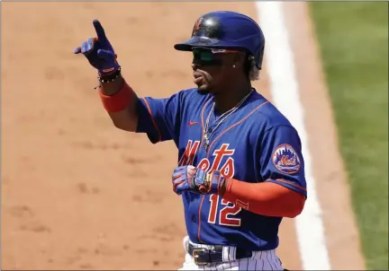  ?? LYNNE SLADKY - STAFF, AP ?? New York Mets’ Francisco Lindor reacts after hitting a two-run homer during during an exhibition game against the Houston Astros, on Tuesday, March 16, in Port St. Lucie, Fla.