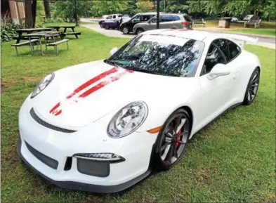  ?? PHOTOS BY PAUL POST — PPOST@DIGITALFIR­STMEDIA.COM ?? A 2015 Porsche 911 GT3 is priced at $151,995.